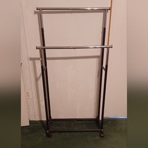 2 tiered clothes rack 31"x58" at highest rack lowest rack is 44"